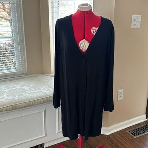 Long black stretchy button down cardigan with pockets.